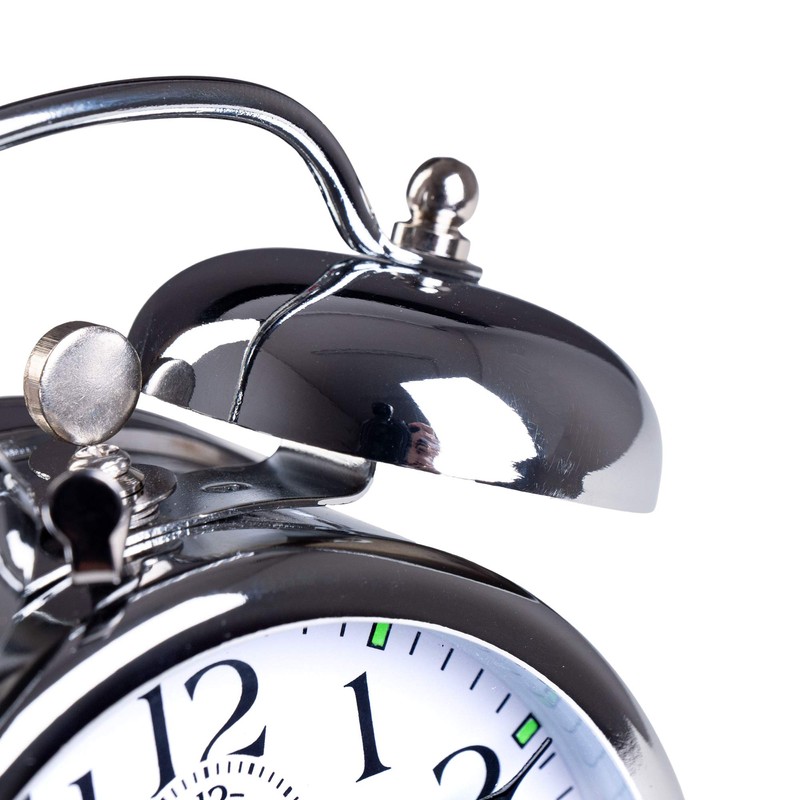 Mechanical lift alarm clock with classic bell ringer, illuminated hands