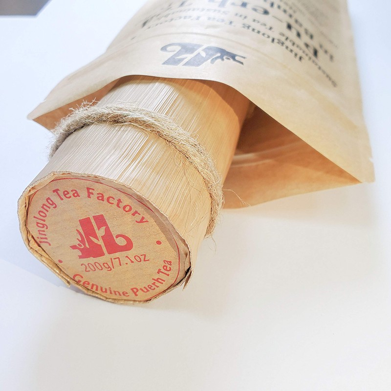 Jinglong Tea Factory - Pu-erh Tea in Bamboo Leaf Tube