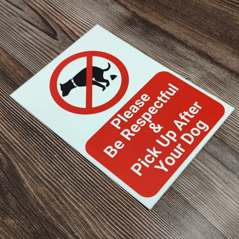 'PLEASE BE RESPECTFUL AND PICK UP AFTER YOUR DOG' SIGN.