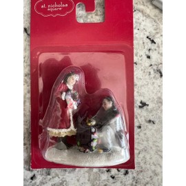 St. Nicholas Square Couple w/christmas lights St Nicholas square