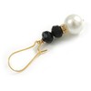 Stylish Black/White Glass Bead Drop Earrings With Gold Tone Bean