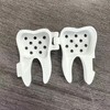 Estuche protector para cabezal de cepillo de dientes con orificio