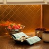 FASÄDE Quilted Decorative Vinyl Backsplash Panel in Polished Copper (6X6
