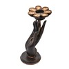 AeraVida Reaching Hand Holding Flower Rain Tree Wood Candle Holder