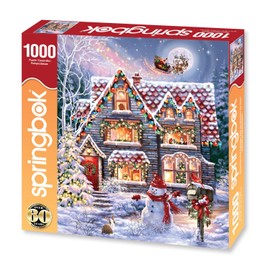 Springbok's Christmas Eve Cottage 1000 Piece Jigsaw Puzzle is a Classic Image of a Cozy Christmas Cottage Complete with Snowman and Santa Sailing Above in His Sleigh