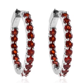 Femme Luxe created garnet gemstone Inside-Out hoop earrings in silver, January birthstone.