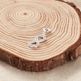 Philip Jones Infinity Charm Created with Zircondia® Crystals