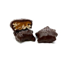 Nuts and chews gourmet candy box. 1 lb candy box of dark and milk chocolate candies with assorted clusters of nuts, pecan crunch bars, caramels, and nougats.