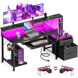 AODK 55 Inch Gaming Desk with Power Outlets & LED Light, Reversible Computer Desk with File Cabinet and Fabric Drawer, Office Desk with Keyboard Tray, Table with Full Monitor Riser and PC Stand, Black