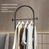 BUZUEY Freestanding Clothing Rack with Marble Base,Modern Black Arch Garment