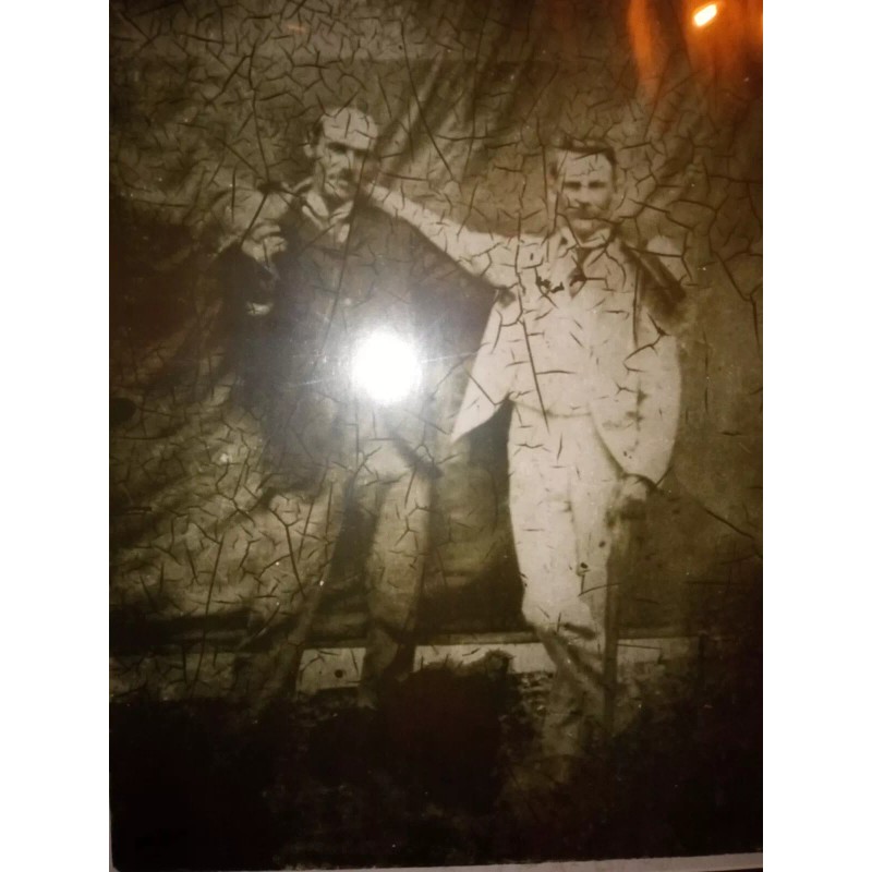 Outlaws Frank and Jesse James sepia tone print, outlaws laughing