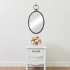Stonebriar 24.6" x 14" Oval Bronze Metal Wall Mirror with