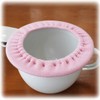 This is an enamel potty cover [100% organic cotton] quinari