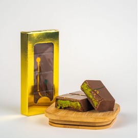 SWEET A LOVE Handmade Luxury Dubai Chocolate Bar combines traditional craftsmanship with indulgent flavors. Inspired by the beloved knafeh dessert, this viral chocolate brings together creamy pistachio, crisp kataifi, and smooth Belgian chocolate into a single, unforgettable bite.