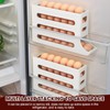 MEETOZ 4 Tiers Egg Holder for Fridge, Automatic Scrolling Egg