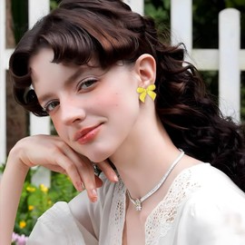 YUJIE Yellow Bow Earrings Gold Bow Earrings for Women Chunky Bowtie Studs Trendy Statement Jewelry