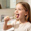 Raspador de lengua portátil de doble cara con cabezales para