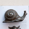 Creative Co-Op Cast Metal Snail Accent Décor, Rust