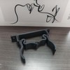 Soporte de pared para aspiradora, color negro