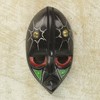 NOVICA Ghanaian Brass and Wood Hand Carved Mask, Multicolor, Stellar