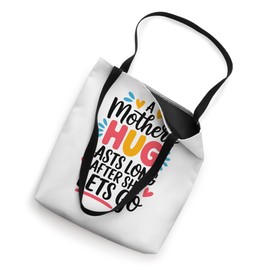 A Mother's Hug Last Long After She Lets Go Mothers Love Tote Bag