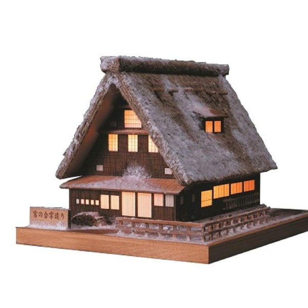 Wooden A House With a Steep Rafter Roof Snow