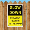 'SLOW DOWN, CHILDREN PLAYING IN THE ROAD' WARNING SIGN. TOUGH,
