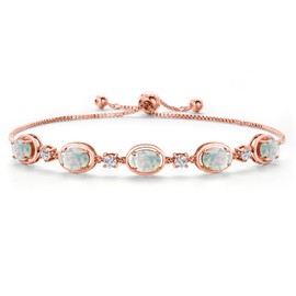 Gem Stone King 18K Rose Gold Plated Silver Simulated White Opal and Moissanite Tennis Bracelet For Women | 5.00 Cttw | Gemstone October Birthstone | Oval Cabochon 7X5MM | Fully Adjustable 10 Inch