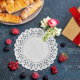 The Baker Celebrations Paper Lace 5 inch White Doilies - Great for Serving Small Treats or Rolling Around Silverware; Made in Canada (pack of 200)
