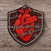 Human Heart Wrapped in Barbed Wire. Embroidered Patch Iron On.