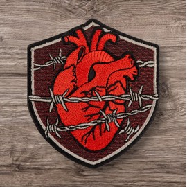 Human Heart Wrapped in Barbed Wire. Embroidered Patch Iron On. Size 3.3 x 3.8 inches.