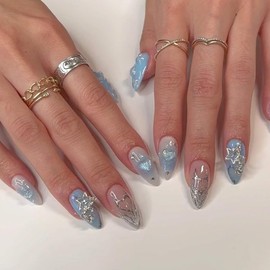 ANDGING Almond Press on Nails with Charms Blue Short Medium Fake Nails with Star Nail Charm Design Acrylic Glue on Nails for Wedding Birthday Stick on Nails with Glue Manicure False Nails for Women