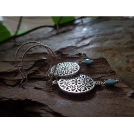 Large delicate mandala and blue crystal: cut-out, long hook earrings in blue and silver-plated