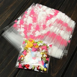 RAYNAG 200 Pcs Resealable Cellophane Bags Self Adhesive Cookie Cello Bags Lovely Heart-shaped Printed Poly Candy Bags for Dessert, Party Treats, Bakery, Candle, Soap, 2.7"x2.7"