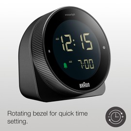 Braun Digital Alarm Clock with Snooze, Negative LCD Display, Rotating Bezel for Quick time Setting, Crescendo Beep Alarm in Black, Model BC24B.