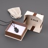 COAI Unisex long chain Hamsa hand pendant made of obsidian,