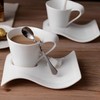 LATRAT Set of 4 stainless steel spoons with curved, curved