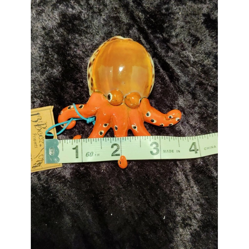 Orange Octopus Cowrie Shell