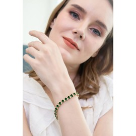 B. BRILLIANT Yellow Gold Flashed Sterling Silver Simulated Emerald 6x4mm Oval and S Tennis Bracelet with White Topaz Accents