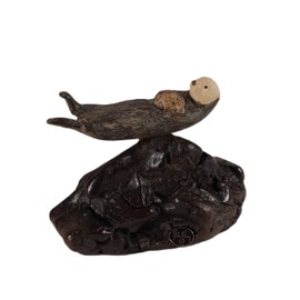 Sea Otter Mother and Pup Sculpture byJohn Perry 5in Long on Polished burlwood Base. Signed.