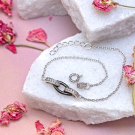 Tuscany Silver Rhodium Plated Oval Black Ceramic and Cubic Zirconia Link Adjustable Bracelet of 15.25-18 cm