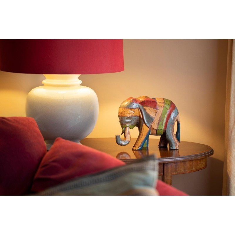 Hand Carved and Painted Wooden Elephant in a Rustic Style