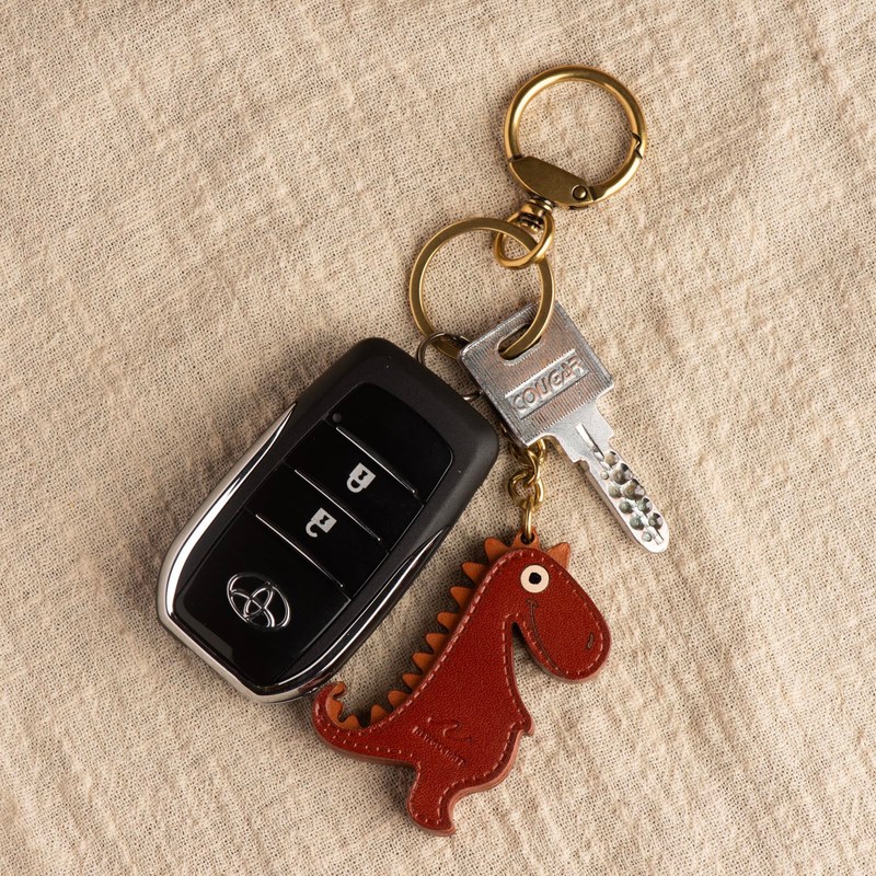 NEWGOCRAFT Cute Dinosaur Keychain Charms Cute Dinosaur Genuine Leather Metal