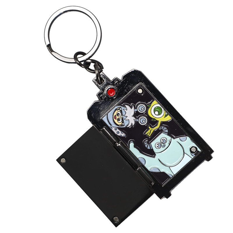 Monsters Inc. Boo's Door Keychain features Boo