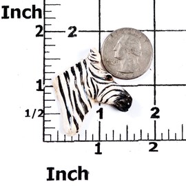 Zebra Head Silicone Mold Chocolate, Fondant, Candy, Mints, Resin, Clay. Mold creates a small flat backed zebra head perfect size for candy, cupcake toppers, jewelry and more.