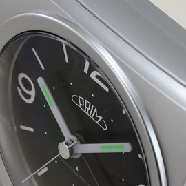 PRIM Radio Alarm Clock with Smooth Flow, Plastic Alarm Clock, Silver & Black, Alarm Amplifier, Repeat Alarm, Light Function, Quartz Movement, Precise and Quiet Operation, Small/Normal