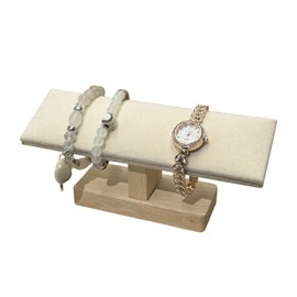 Segvi T-shaped watch stand and bracelet stand is equipped with a removable design.Made from grey faux suede.Measures 7.75 x 2 x 3.5 inches.