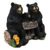 Papa Mama Black Bears and Cub Sitting On Log with