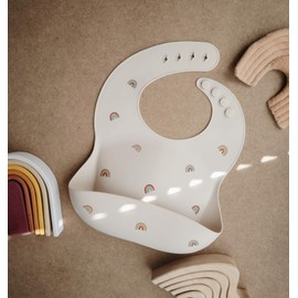 mushie Silicone Baby Bib | Adjustable Fit Waterproof Bibs (Rainbows)
