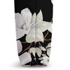 White Magnolias Floral Pattern on a Black Background Tote Bag